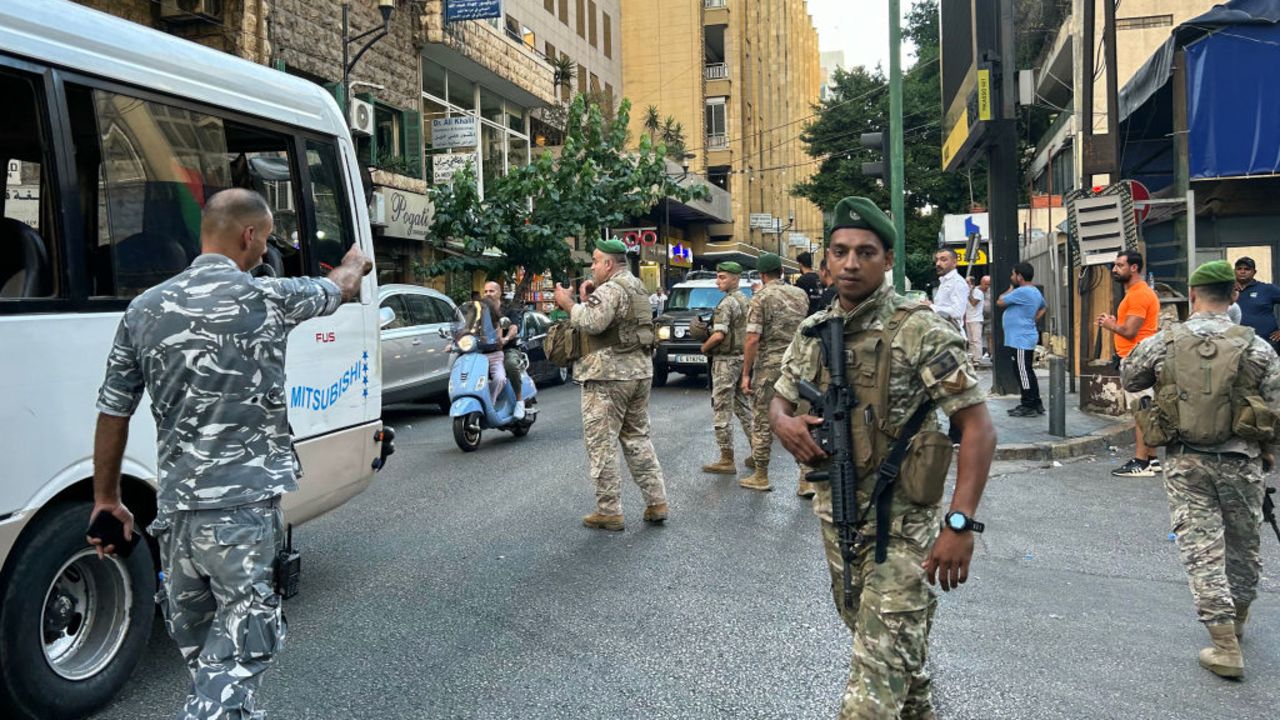 Lebanese army soldiers stand guard in Beirut on September 17, 2024, after explosions hit locations in several Hezbollah strongholds around Lebanon amid ongoing cross-border tensions between Israel and Hezbollah fighters. Hundreds of people were wounded when Hezbollah members' paging devices exploded simultaneously across Lebanon on September 17, in what a source close to the militant movement said was an 