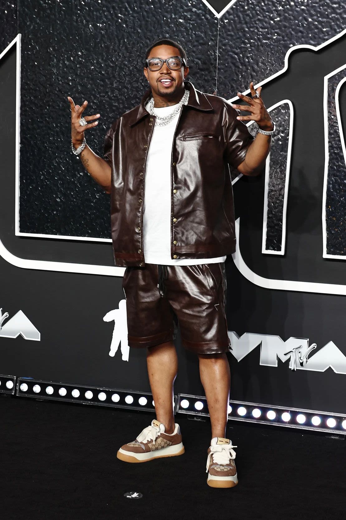 Lil Scrappy arrived in a casual two-piece leather ensemble and Gucci sneakers. Credit: Jamie McCarthy/WireImage/Getty Images.