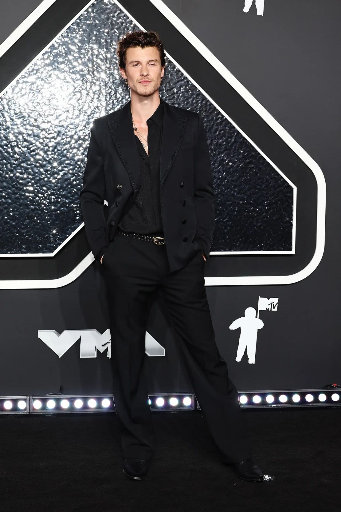 Shawn Mendes arrived before his performance in a Dolce & Gabbana wool tuxedo with flared pants and a silk shirt. Credit: Jamie McCarthy/WireImage/Getty Images.