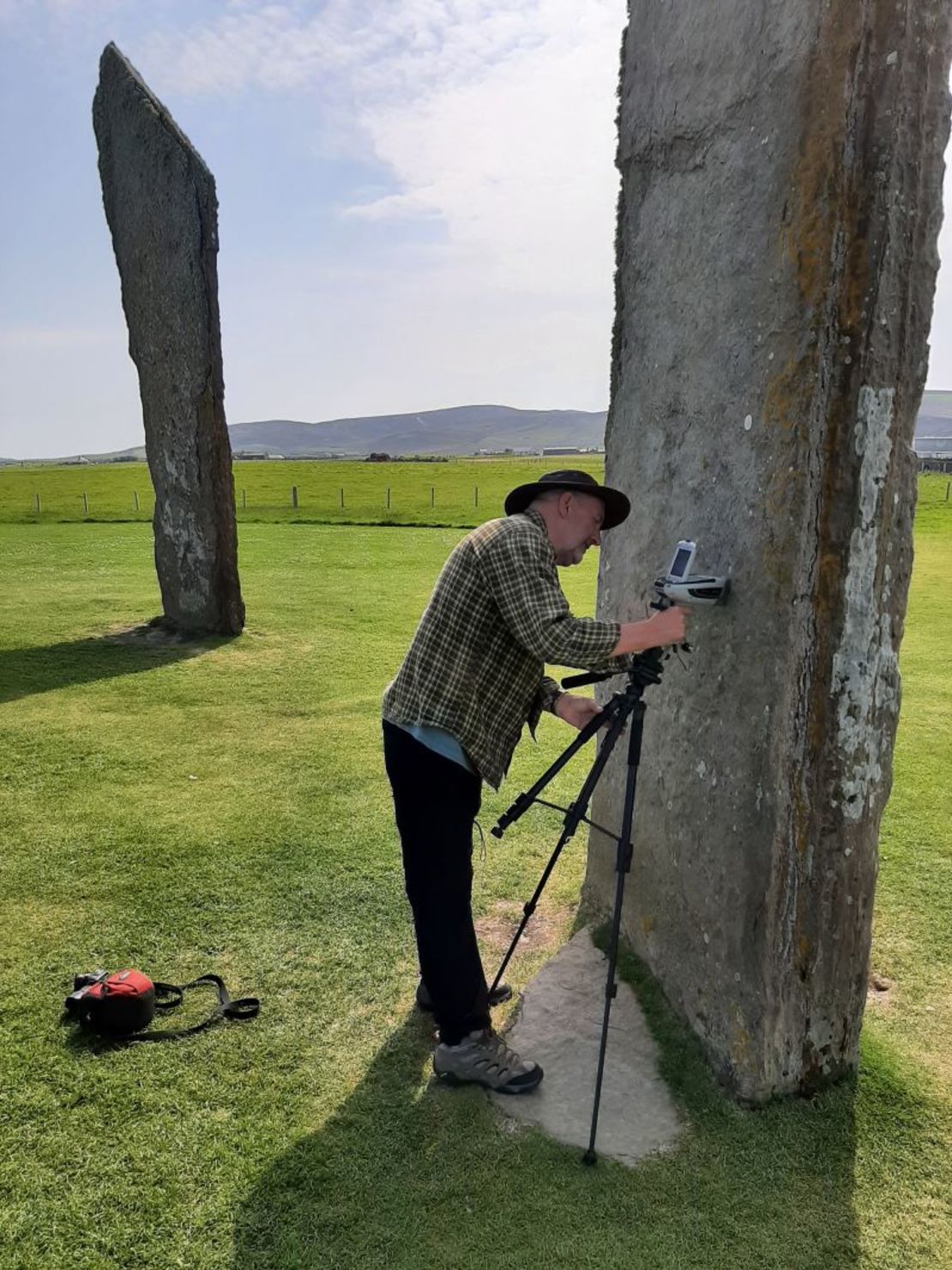 Study co-author Nick Pearce, professor of geography and Earth sciences at Aberystwyth University, analyzes Neolithic stones in Orkney, an archipelago off the northeast coast of Scotland.