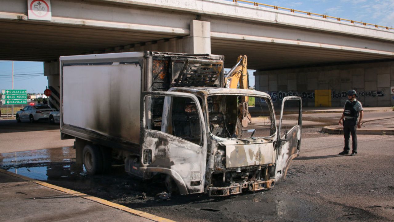 A burned truck is seen on the streets of Culiacan, Sinaloa State, Mexico, on September 11, 2024. Elements of Mexico's National Guard were deployed in the state of Sinaloa, in the northwest of the country, amid an escalation of violence that authorities attribute to internal struggles within the Sinaloa cartel following the capture of its leader, Ismael 